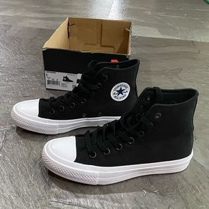 All black high top Converse